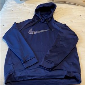 Men’s navy blue Nike Dri-Fit hoodie.